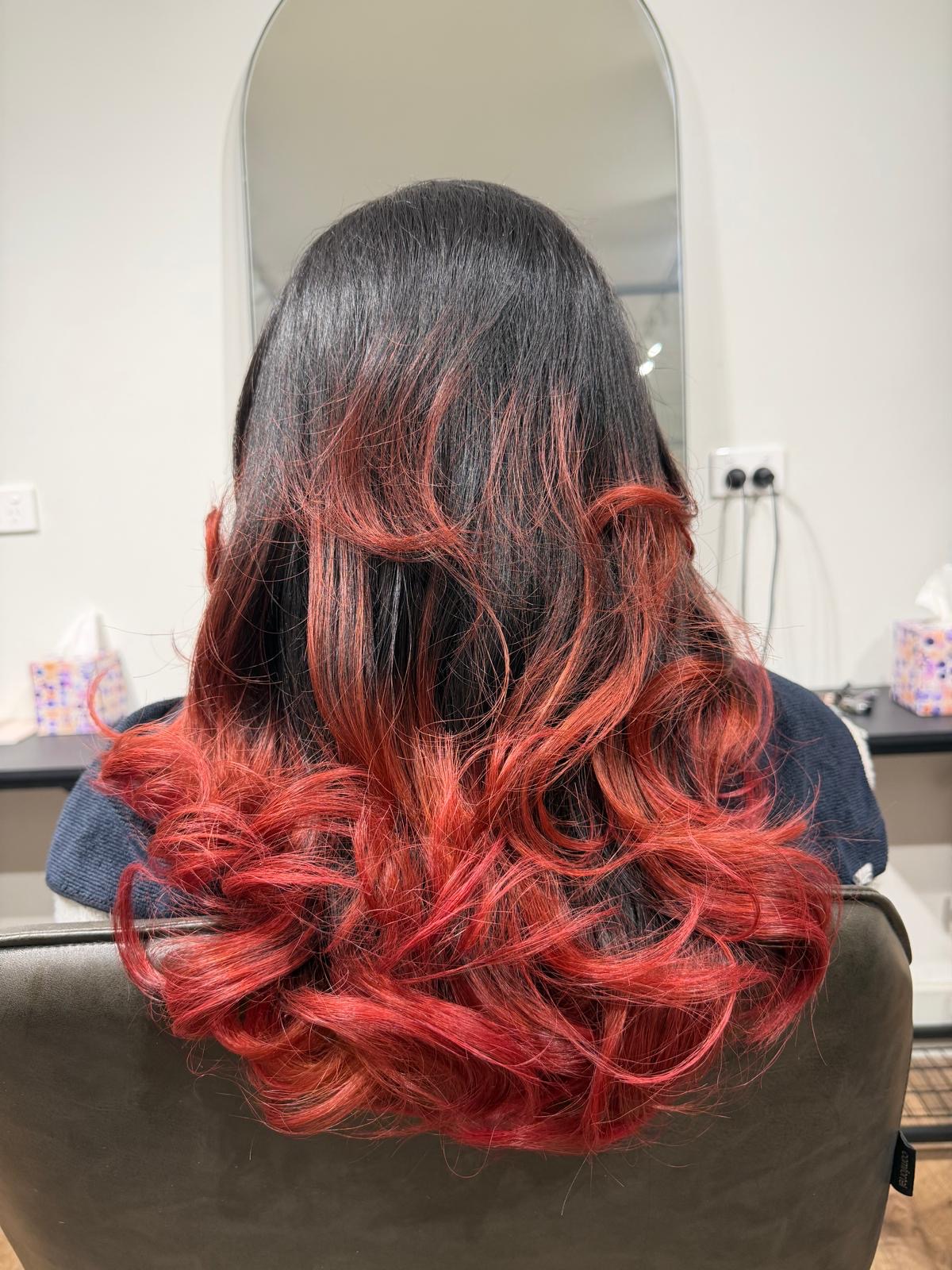 Red ombre hair colour created with ammonia-free, organic colour at our North Kellyville salon